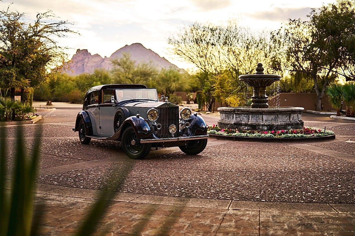 Vintage Rolls-Royce at the Arizona Biltmore Resort entrance with Piestewa Peak