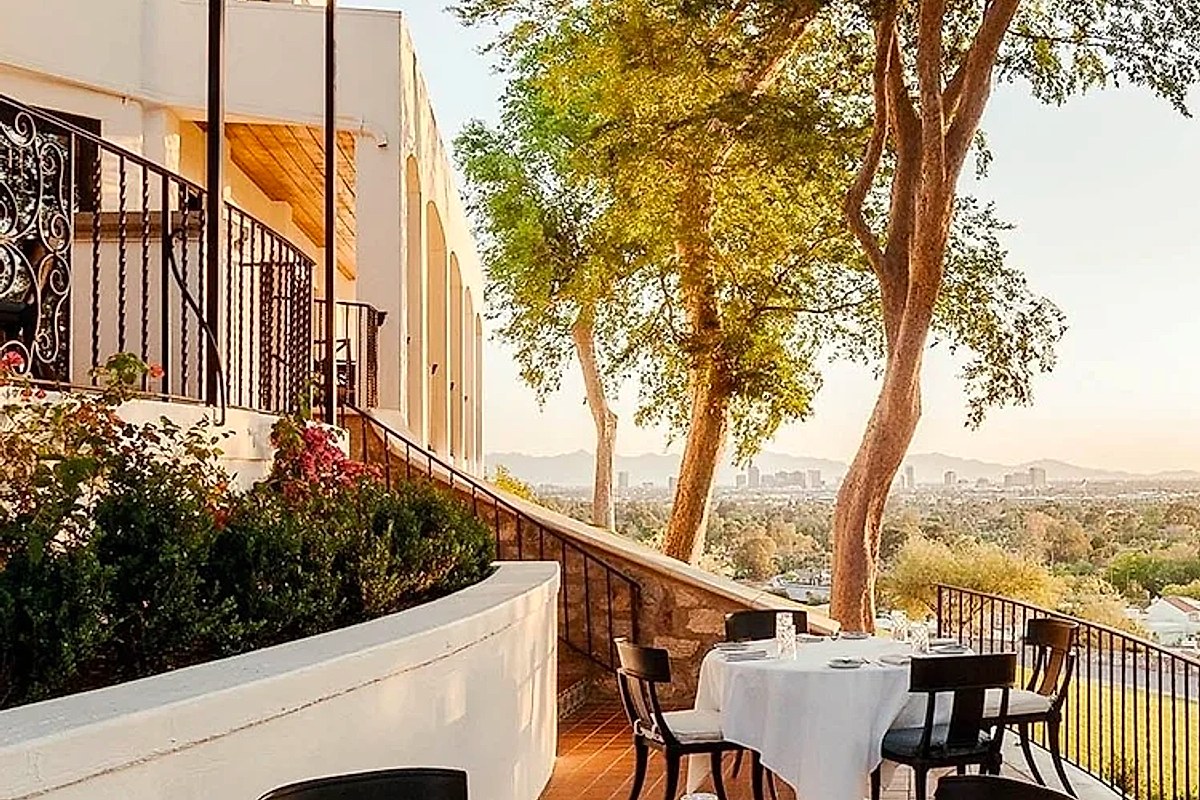 Wrigley Mansion terrace dining with golden hour valley views