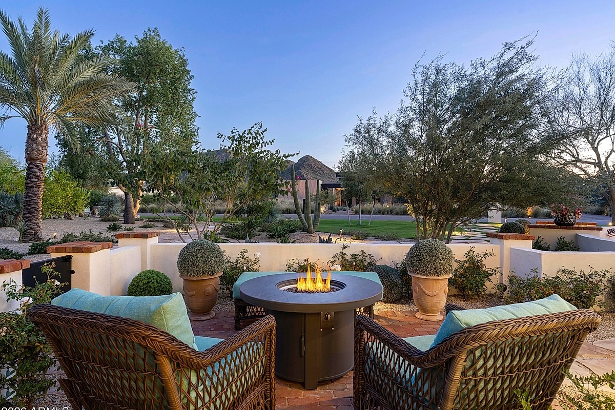 Outdoor fire pit at twilight on a Paradise Valley estate